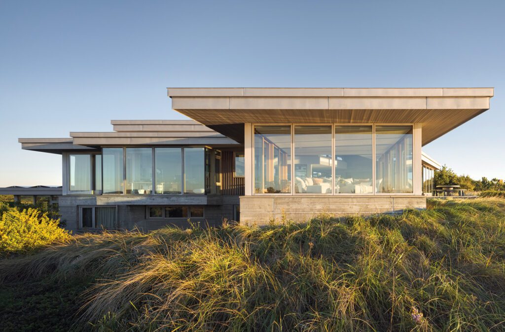 A contemporary Cape Cod home set on a sand dune.