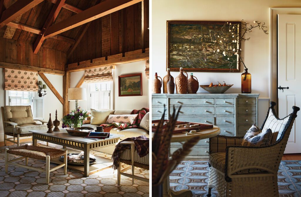 Warm living room with exposed timber beams, floral window treatments, and layered seating around a central coffee table